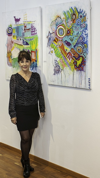 Sissi Dagan and her artworks.jpg